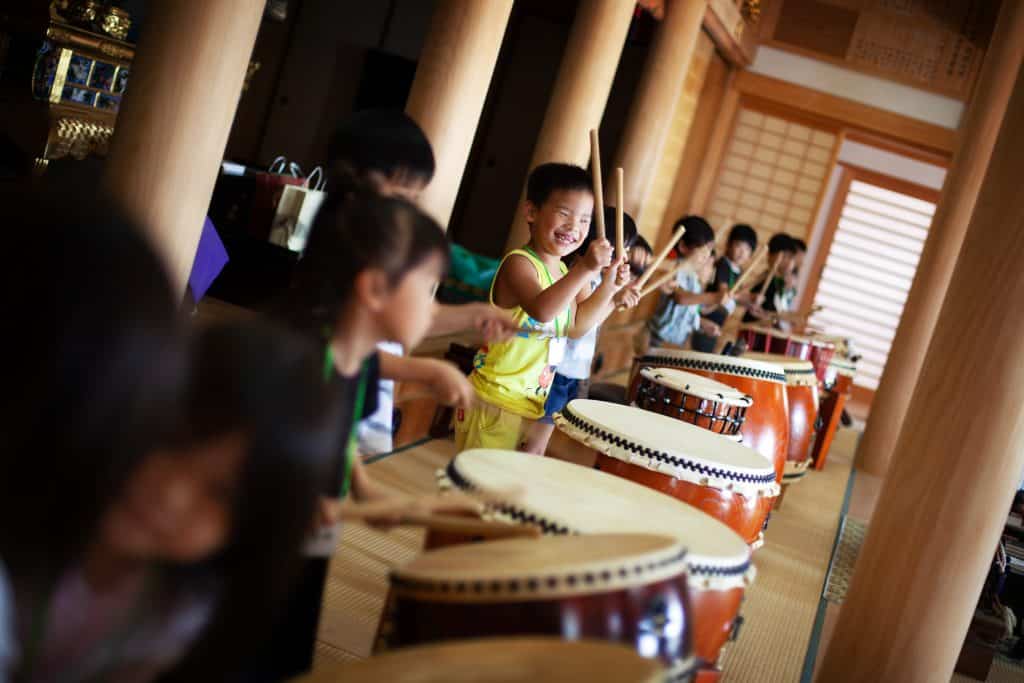 Group of Children Playing Drums