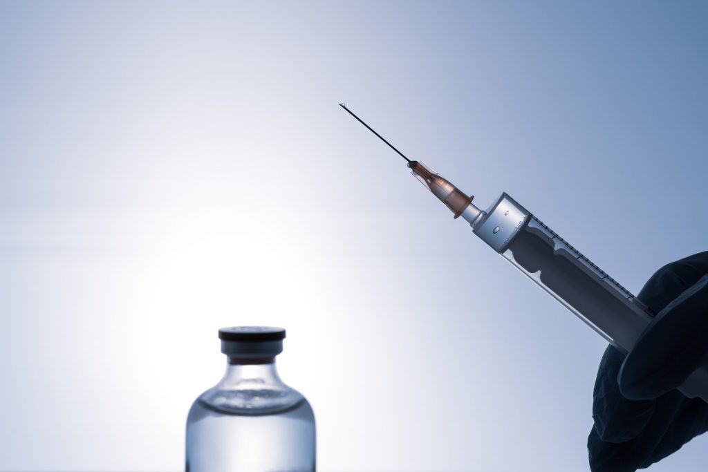 Bottle with solution for injection and injection needle